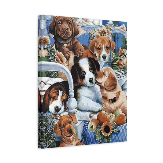 Paint by numbers artwork of six adorable puppies sitting together among flowers and cushions, with vibrant colors and detailed shading shown in a frame.
