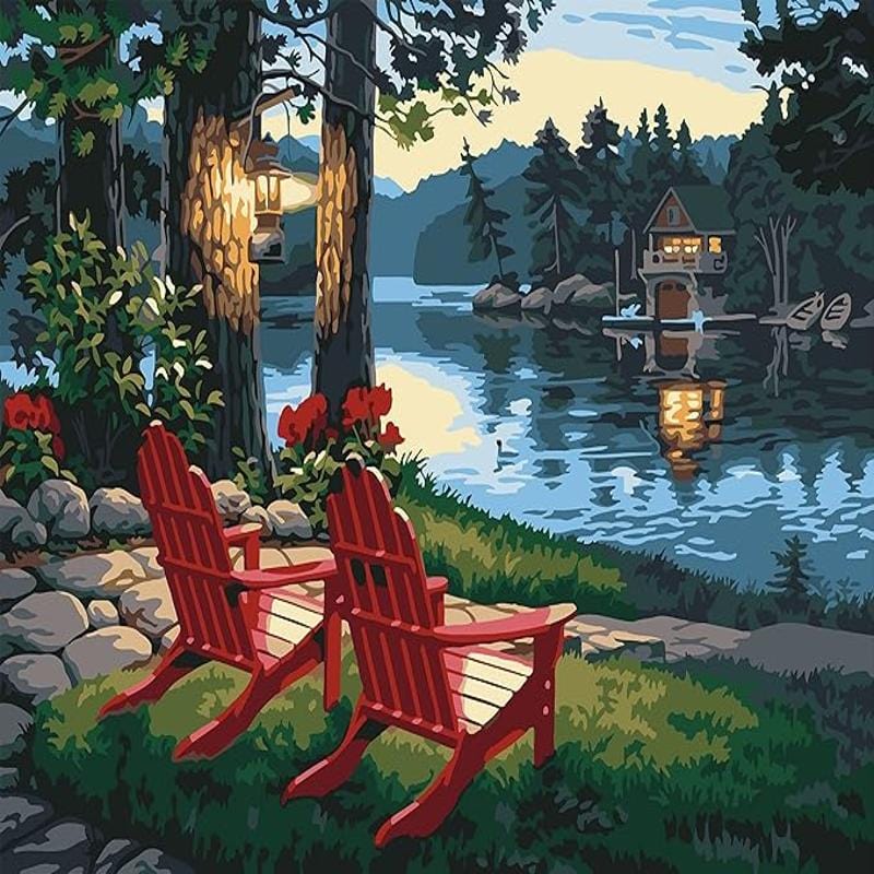 Soothing View Paint By Numbers Kit showcasing a serene lakeside scene with Adirondack chairs, vibrant flowers, and a glowing lantern.