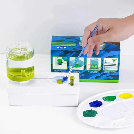 Hand using Automatic Brush Cleaner Pro with paintbrush and color palette during painting