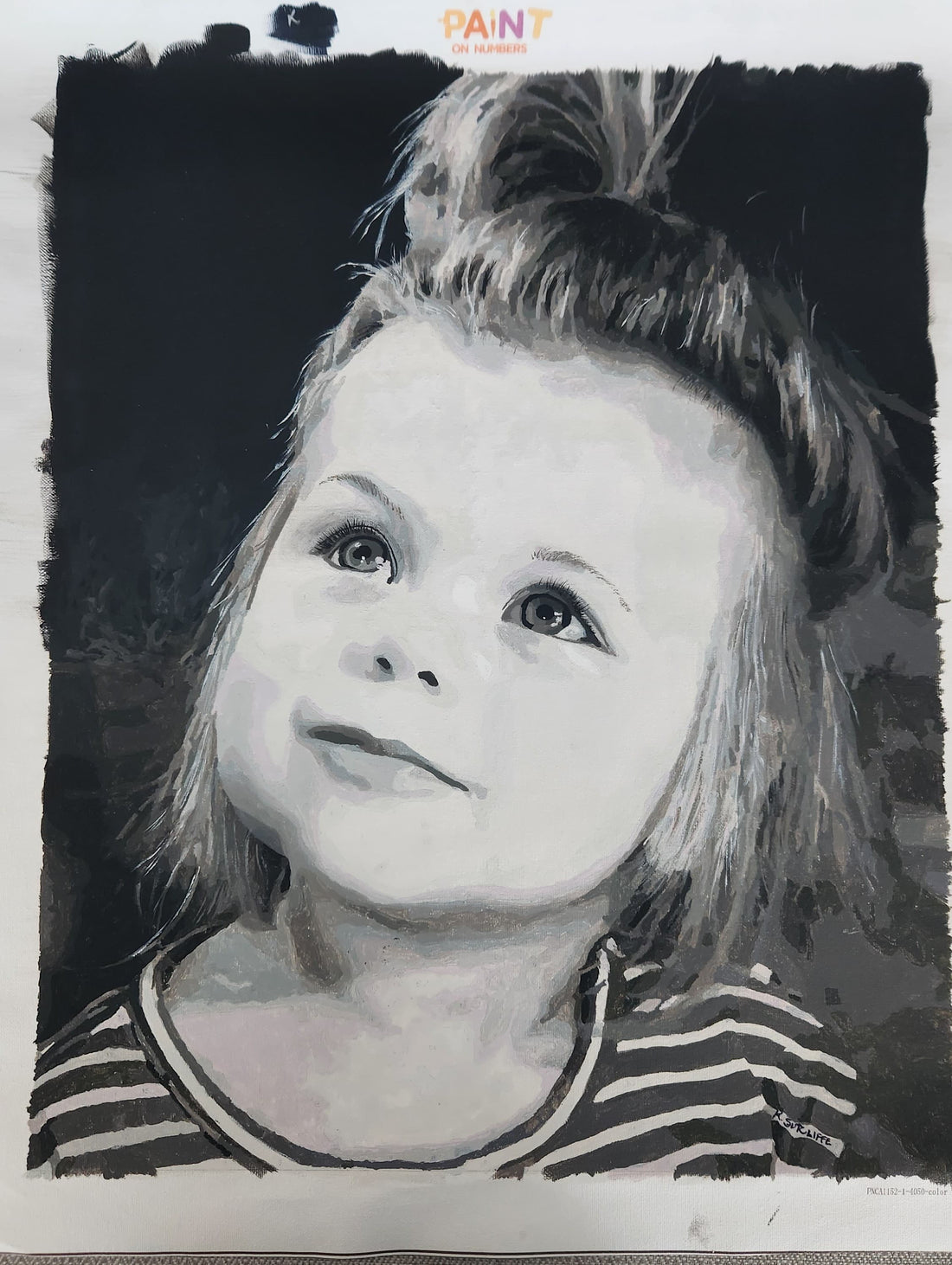 A black and white portrait drawing of a young child with a messy bun, rendered in a sketch-like style with rough painted edges. The artwork fills most of the frame, with a small 'PAINT On NUMBERS' logo visible at the top.