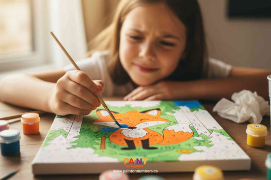 A girl focused on painting a colorful fox paint-by-numbers canvas at a table with small paint pots around her.