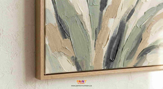 Close-up detail of a framed paint by numbers canvas showing textured brushstrokes and a natural wood frame for a premium finished look.