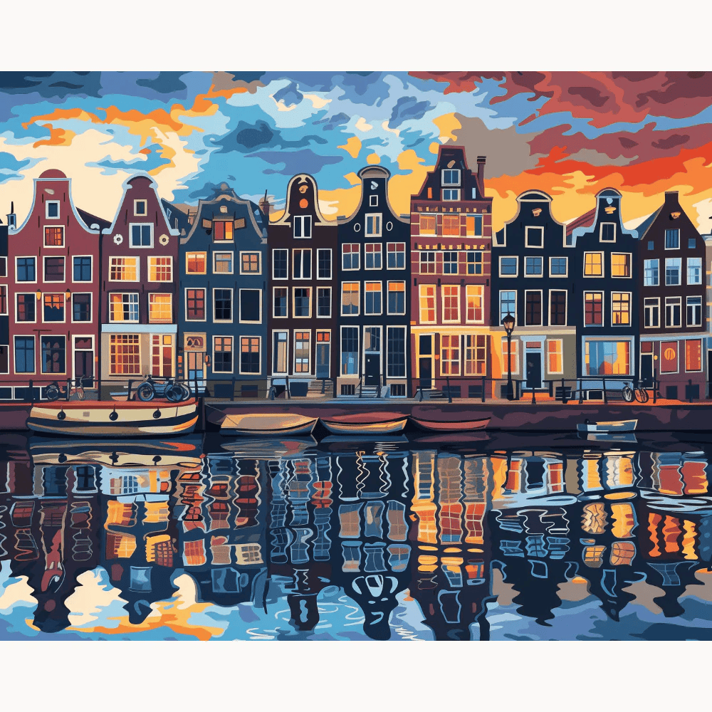 Paint By Numbers artwork of colorful canal houses and boats at sunset in Amsterdam, with vibrant reflections on the water and a dramatic, cloud-filled sky.