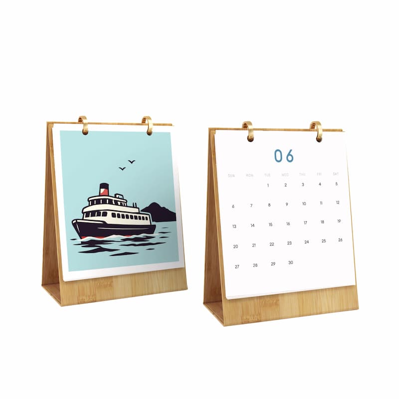 Two bamboo A-frame desk calendars on a white background, one showing a light blue illustration of a ferry and the other displaying the date 06 with a blank calendar grid.