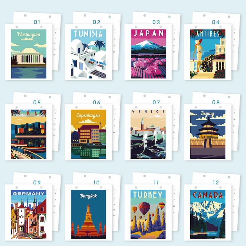 A set of 12 travel poster cards arranged in a 3-by-4 grid on a pale blue background. Each card shows a different city or destination with illustrated scenery and country names: Washington, Tunisia, Japan, Antibes, Germany, Copenhagen, Venice, Beijing, Bangkok, Turkey, and Canada.