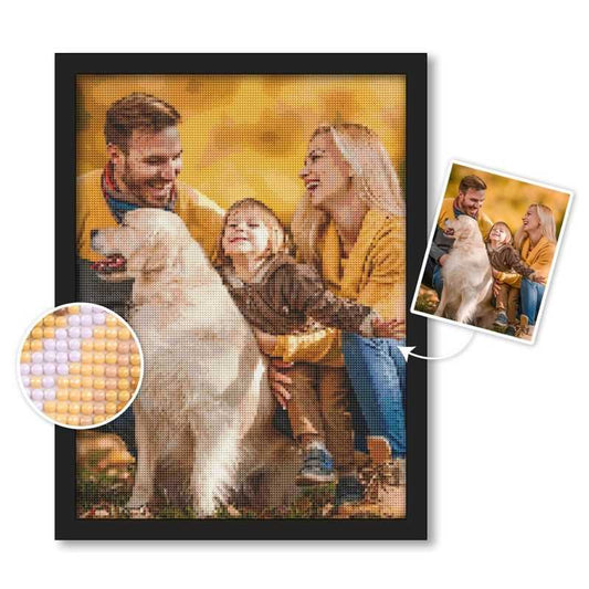 Custom diamond painting showing a joyful family moment with a smiling couple, their happy child, and a playful golden retriever, captured beautifully in warm golden tones. The detailed close-up highlights the vibrant diamond raisins, emphasizing the artwork's quality and texture.