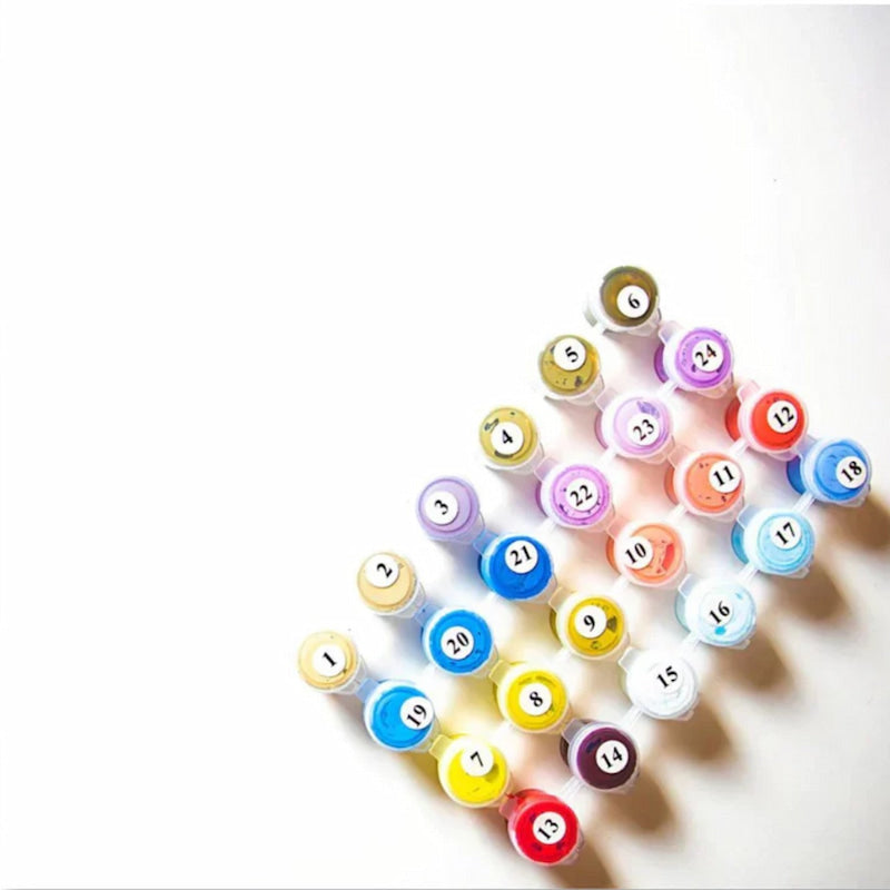 Set of colorful markers with numbered caps on a white background