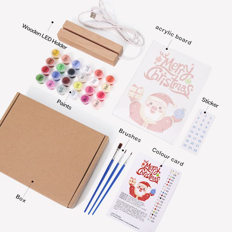 Artistic supply set with paints, LED holder, brushes, and Christmas-themed items on a white background.