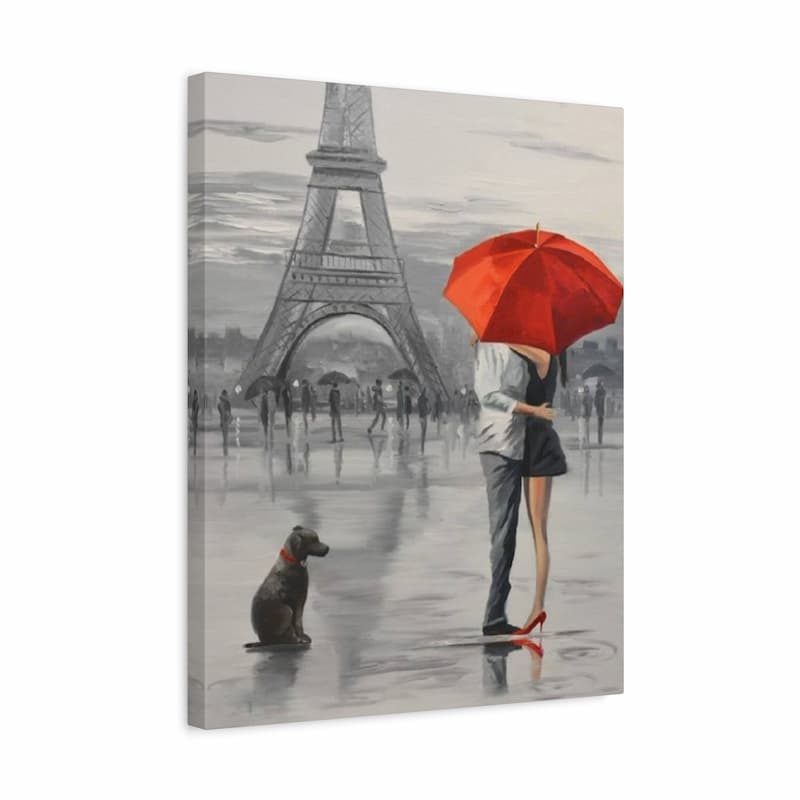 Canvas print of a romantic scene with a couple under a red umbrella near the Eiffel Tower.