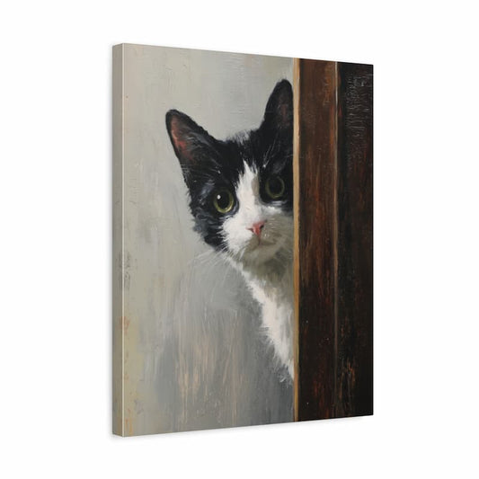 Canvas print of a black and white cat with a wooden frame on a white background