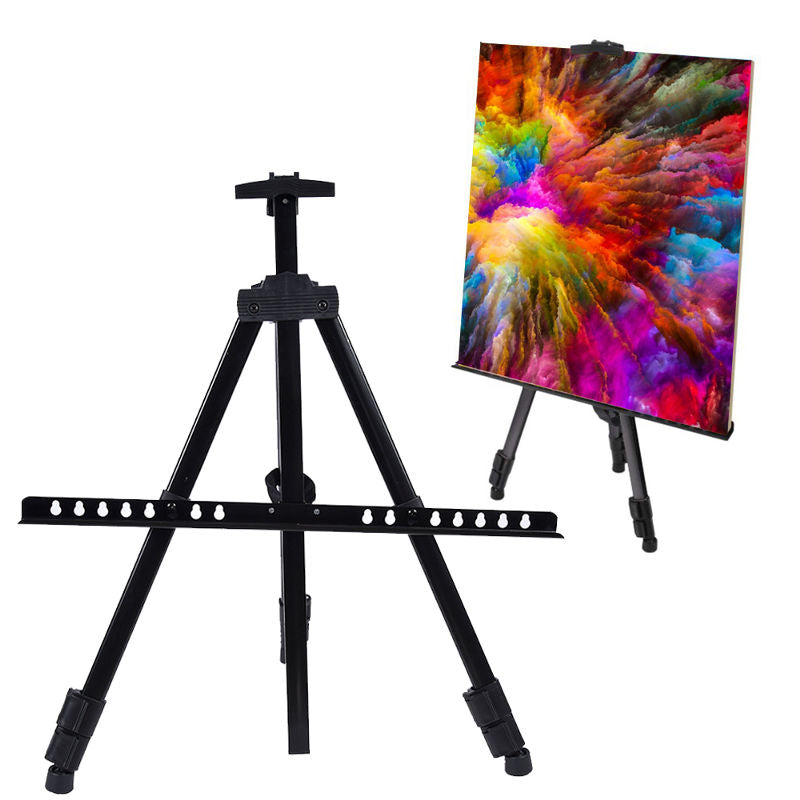 Black artist easel with a colorful tie-dye painting on a white background