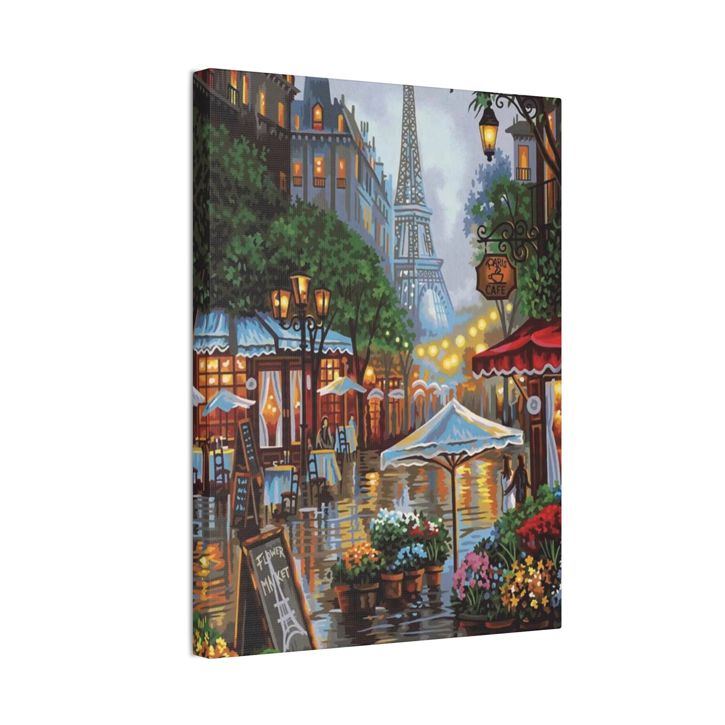 Romantic Parisian street scene with blooming pink flowers and city charm captured in a paint by numbers kit for adults shown in a frame. 