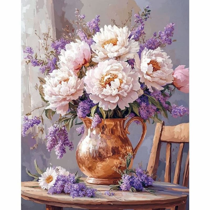 Bouquet of flowers in a copper pitcher on a table with a chair in the background