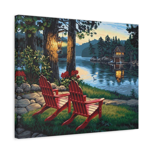 Soothing View Paint By Numbers painting featuring two red Adirondack chairs by a glowing lantern and peaceful lake, with a forest cabin reflecting in the water under a sunset sky shown in a frame
